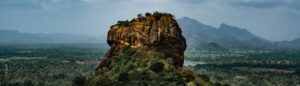 Sigiriya Rock Fortress in Sri Lanka, a UNESCO World Heritage Site, rising above the jungle.